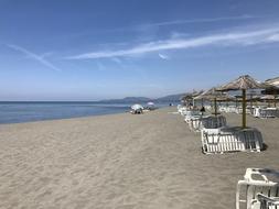 parasols and sunbeds on Beach, Montenegro, Ada bojana