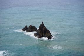 big rocks in the blue sea