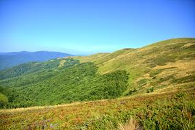 Bieszczady Mountains beneath clean blue sky, poland