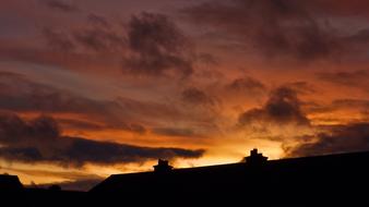 silhouette of trees with clouds view