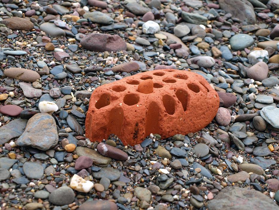 red brick on the beach