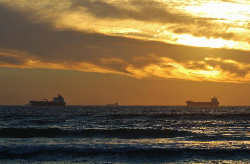 Sailing ships at sunset