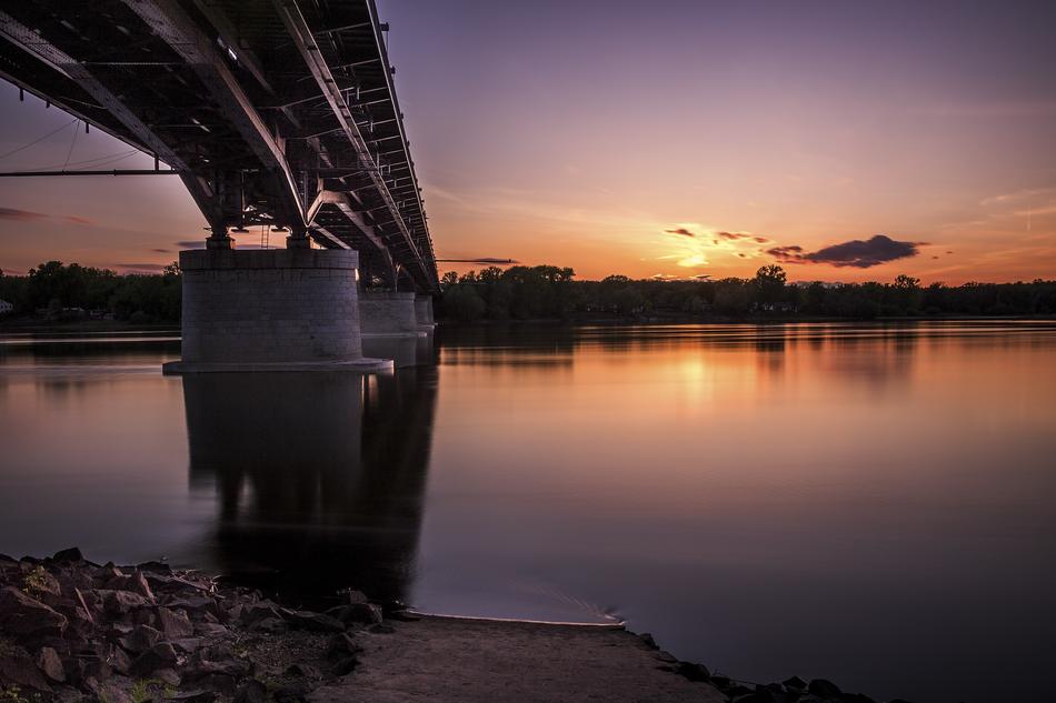 long bridge with the sunset as a backdrop