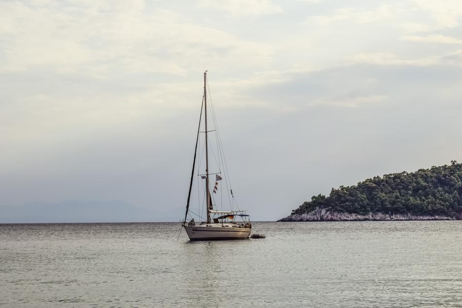 a boat sailing in the boundless sea