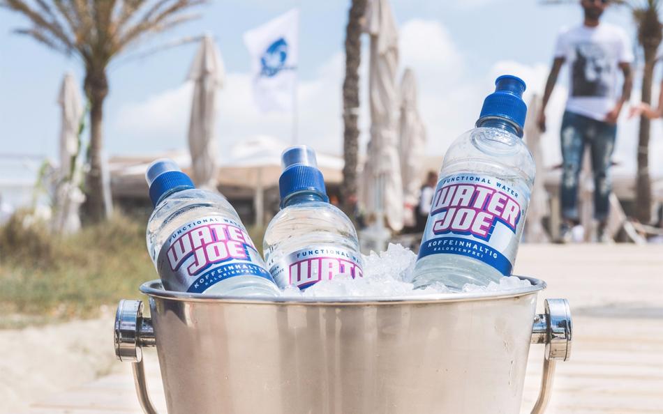 Plastic bottles of water in ice
