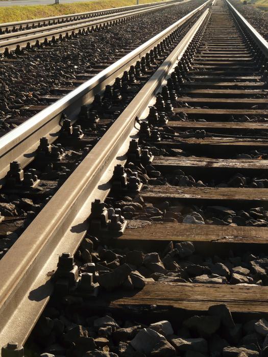 Iron rails in the sunlight