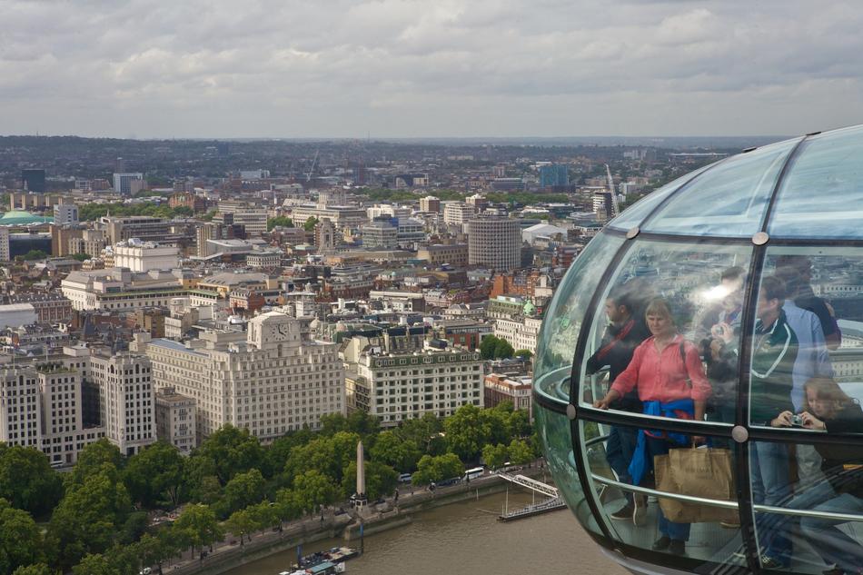 People in a transparent elevator