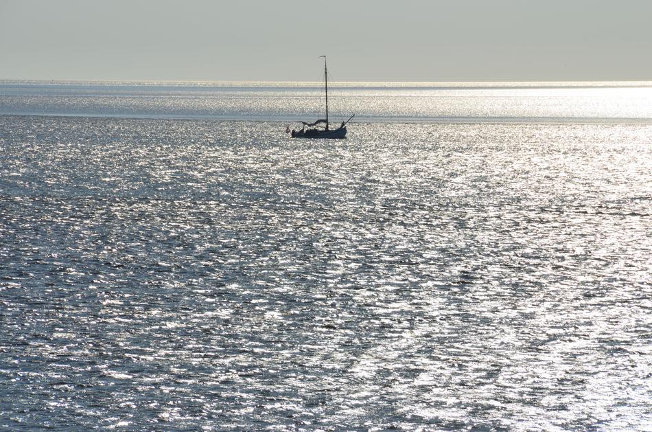 floating boat in the distance