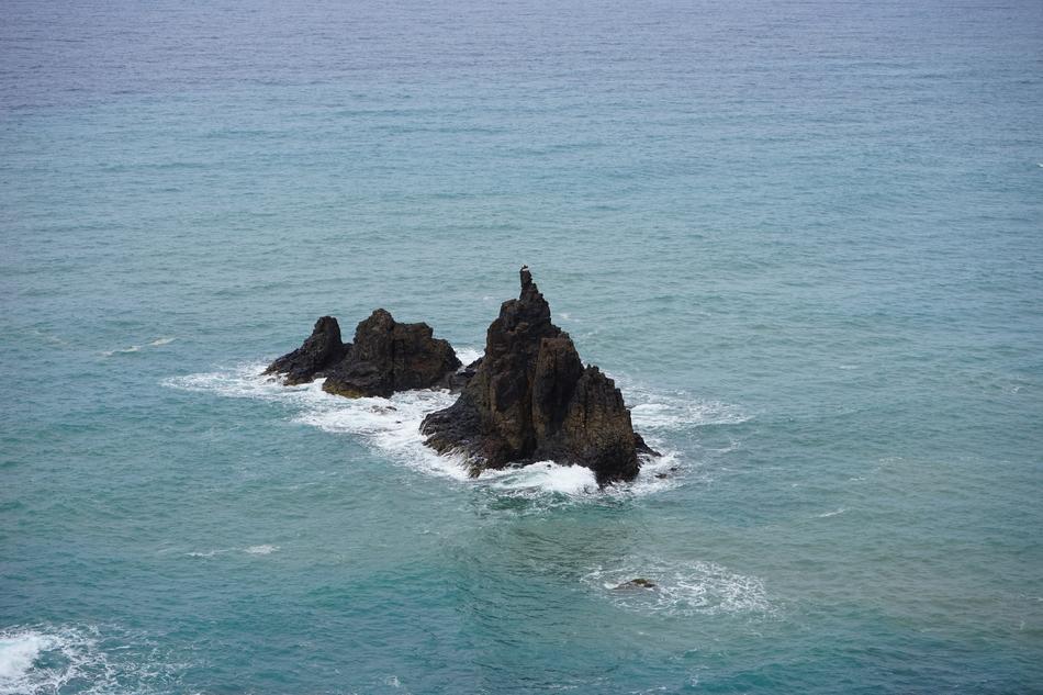 big rocks in the blue sea