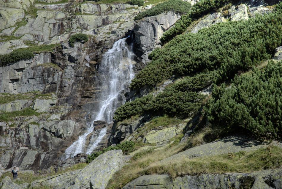 wild waterfall flowing down the rocks