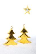 Christmas trees, golden Decorations in snow