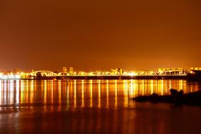 beautiful glowing city by the river
