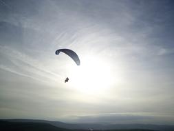 Paragliding, person Flying in sky at dusk
