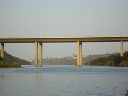 long yellow bridge with the sea
