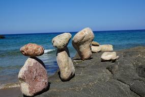 stone figures on the beach