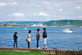 friends play by the water