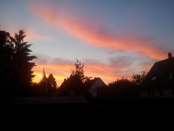 pink sunset over the church
