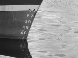 figures on a boat in the lake