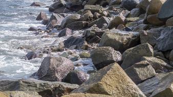 stone beach with sea background
