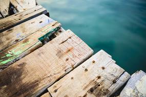 wooden bridge near the lake background