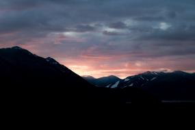 sunset by the mountains