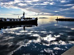 clouds reflecting in the sea