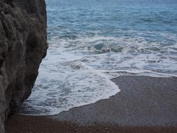 big stone with water