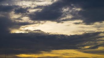 clouds with the sun in the sky