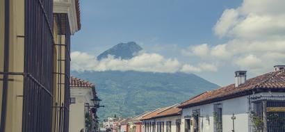 view of the mountain with clouds from the city