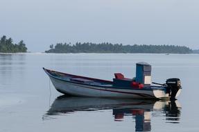 A lonely boat far from the shore