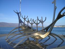 modern sculpture of Viking ship in Iceland