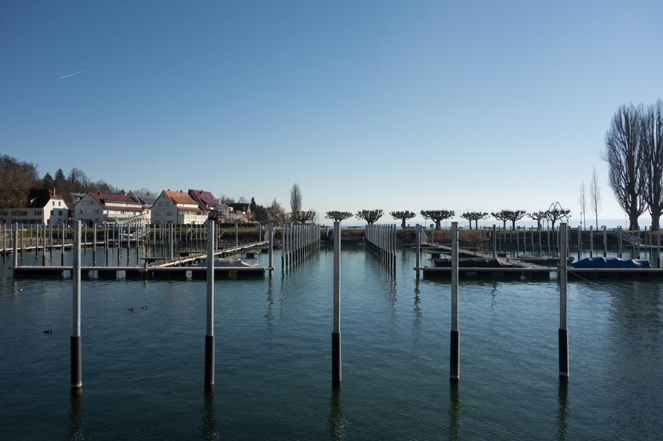iron pipes with a house on the wharf