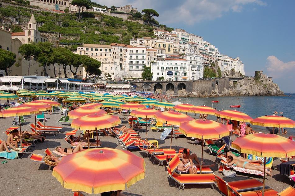 colored umbrellas on the sandy beach