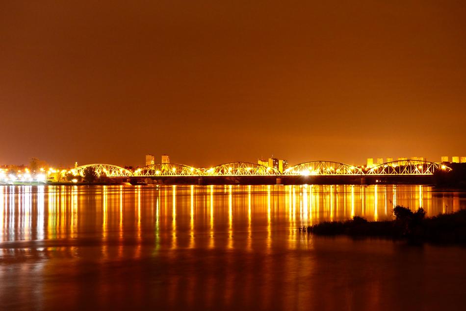 beautiful glowing city by the river