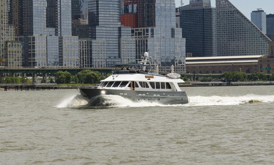sailing yacht by the city