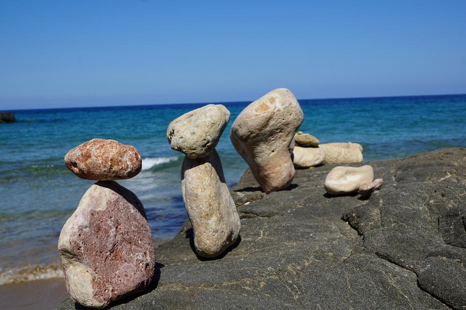 stone figures on the beach