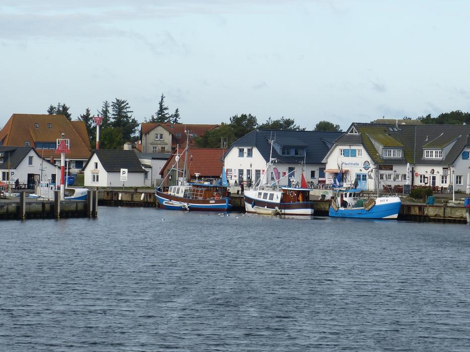 boat at the houses on the river