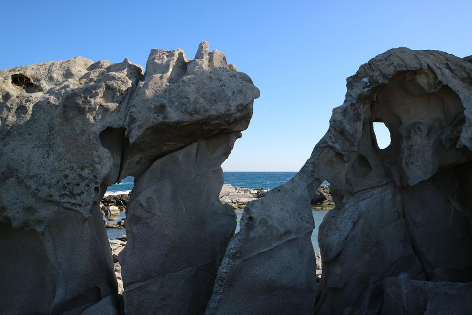 rocks beach beach sea blue
