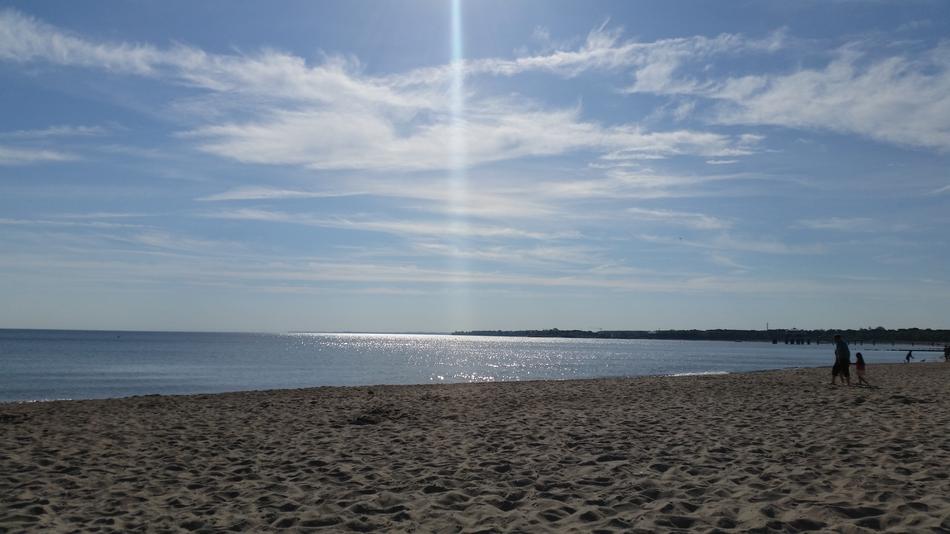 sunbeam over the sea and beach