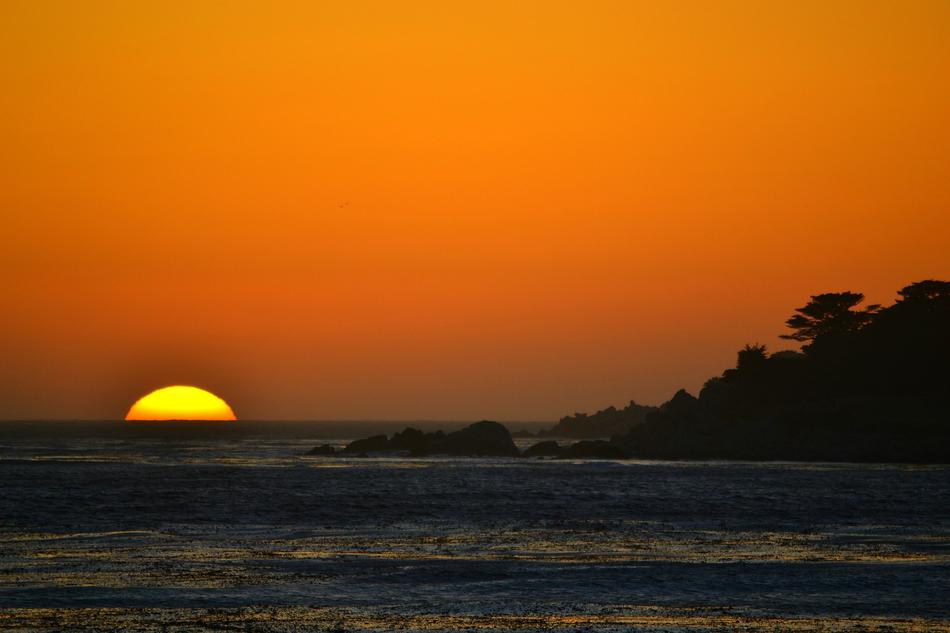 brilliant sunset by the calm sea
