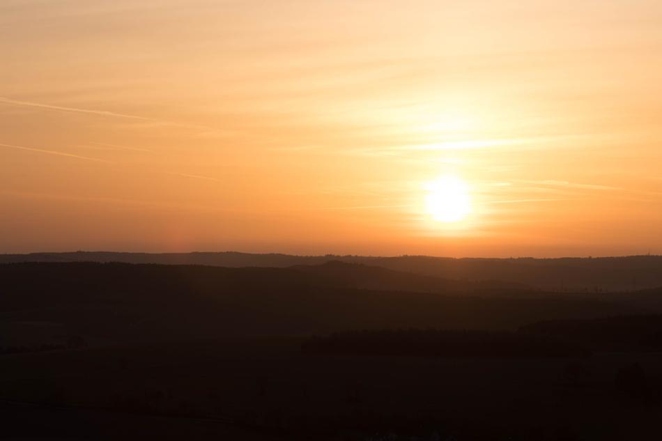 The sun burning in the distance