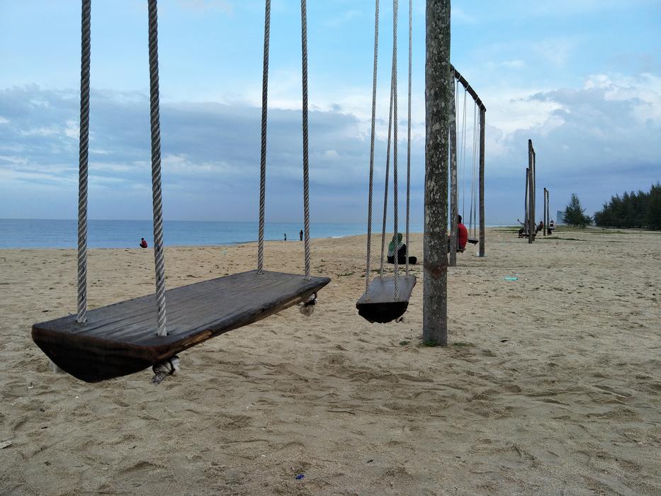swings sand ocean landscape