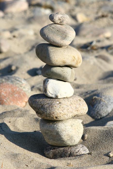 stone tower on sand