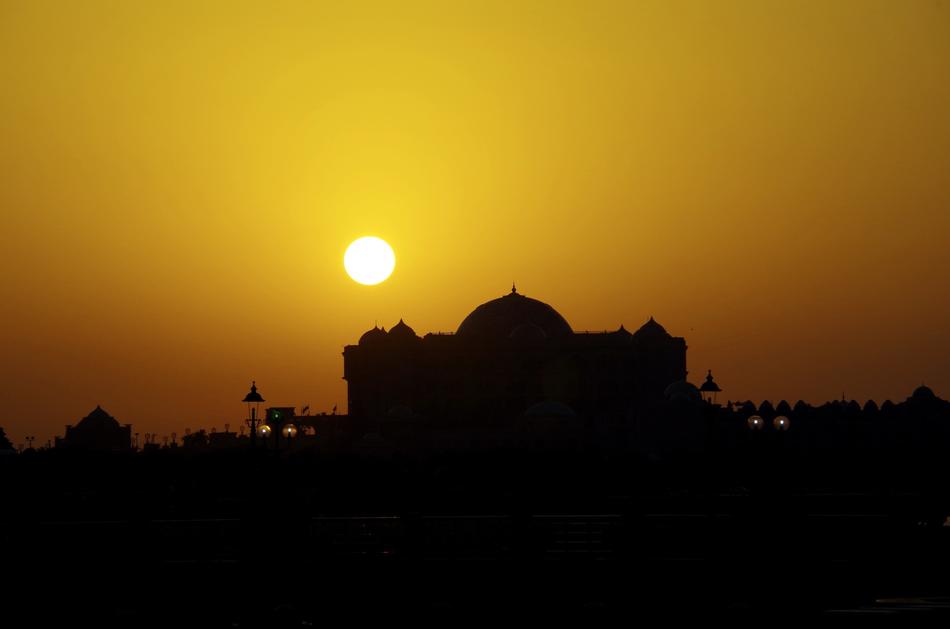 the sun illuminating the building