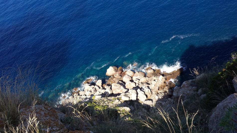 view of the blue water from above