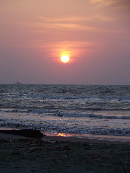 sunset in the sea on the beach
