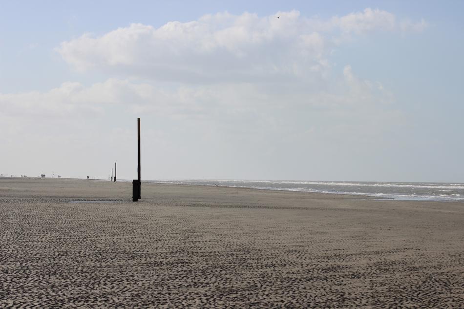 pole on the beach of the sea