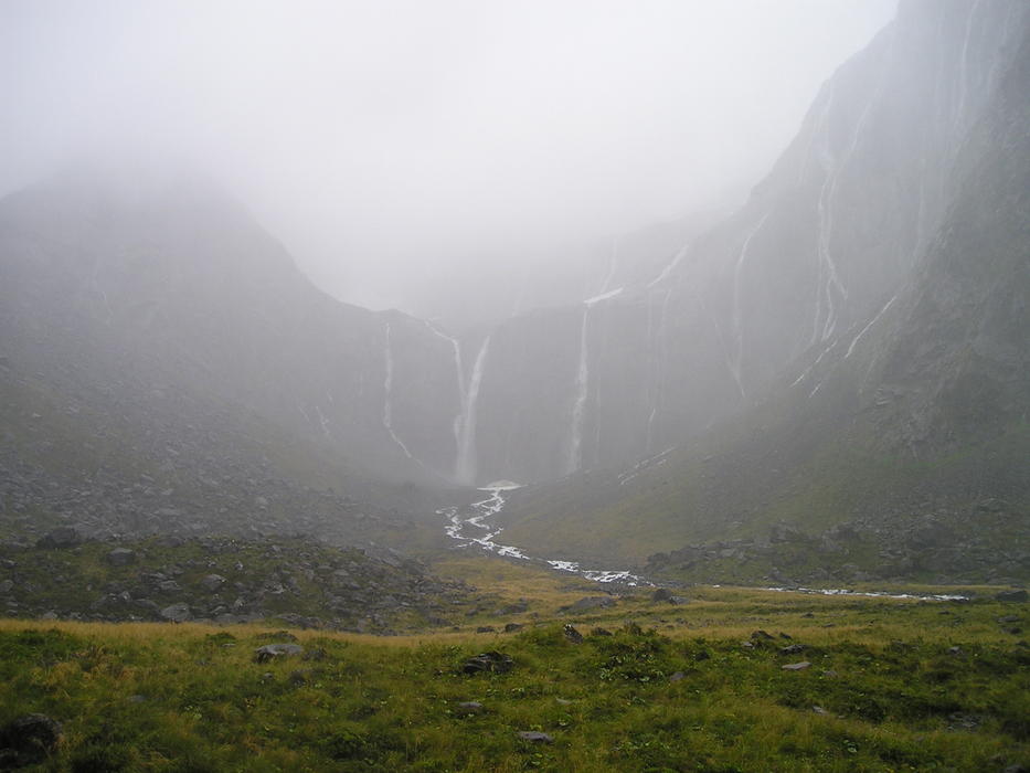 waterfalls in the haze in the nature of new zealand