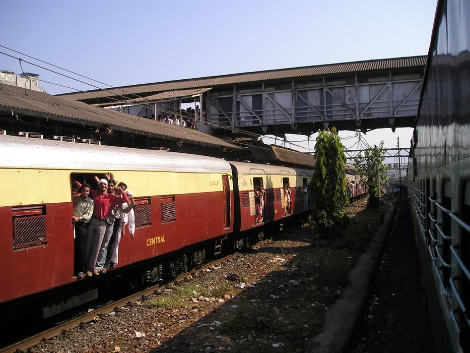 crowd of people on a train to Mumbai, India