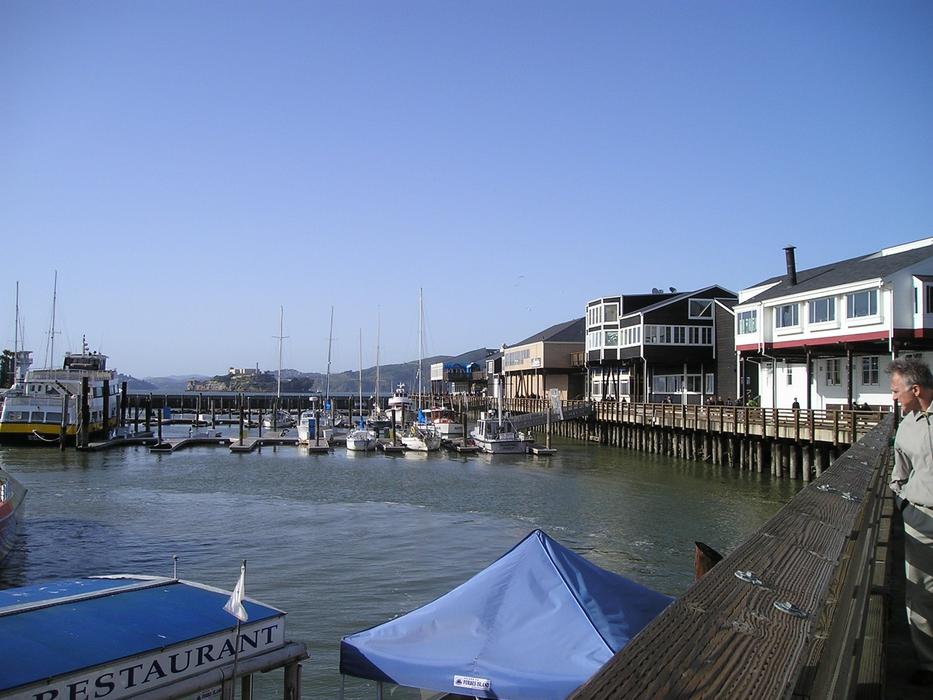 Port of the Alcatraz, with the houses, in an Francisco, California, USA, under the blue sky